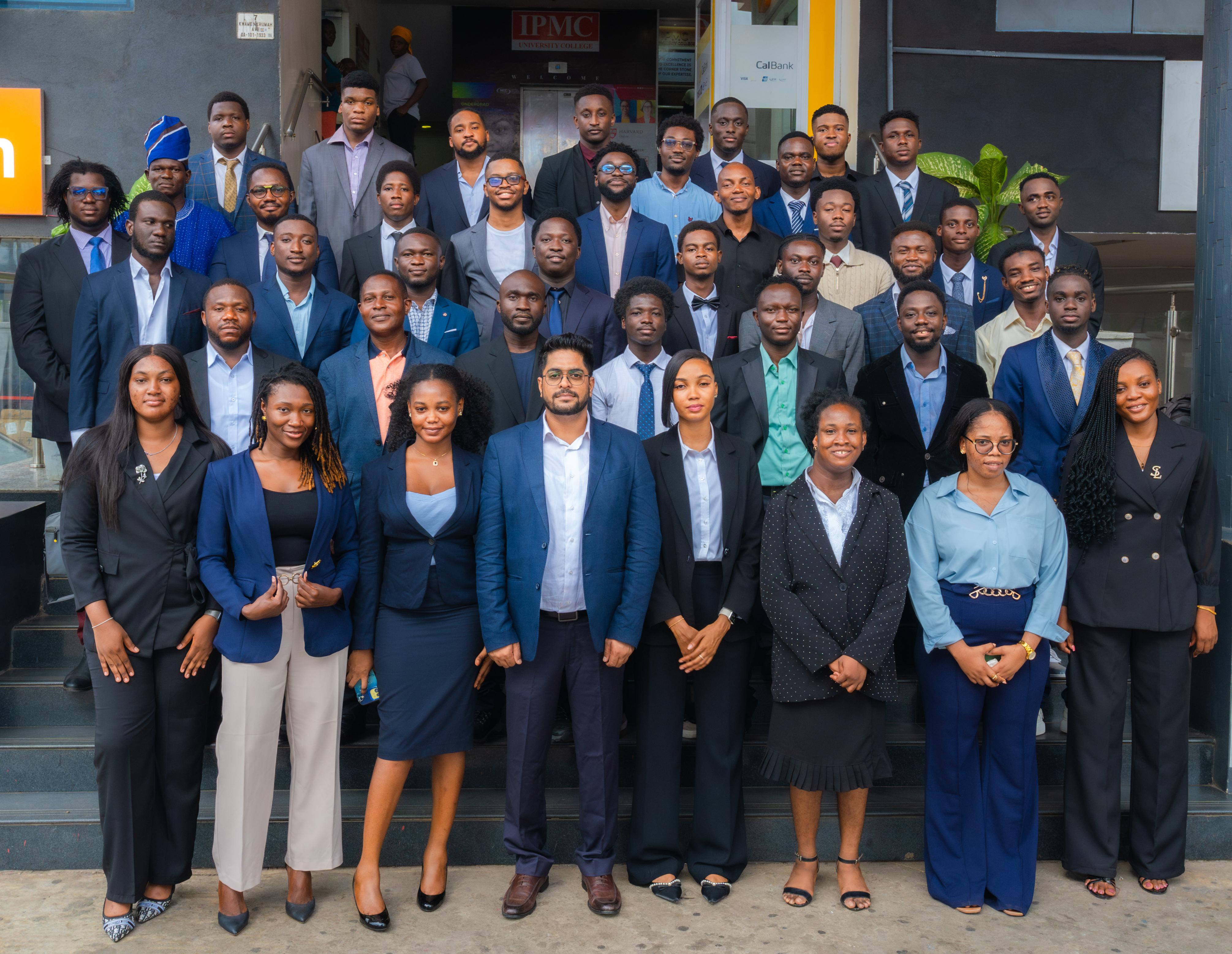A large group of IPMC students and staff at the university college entrance