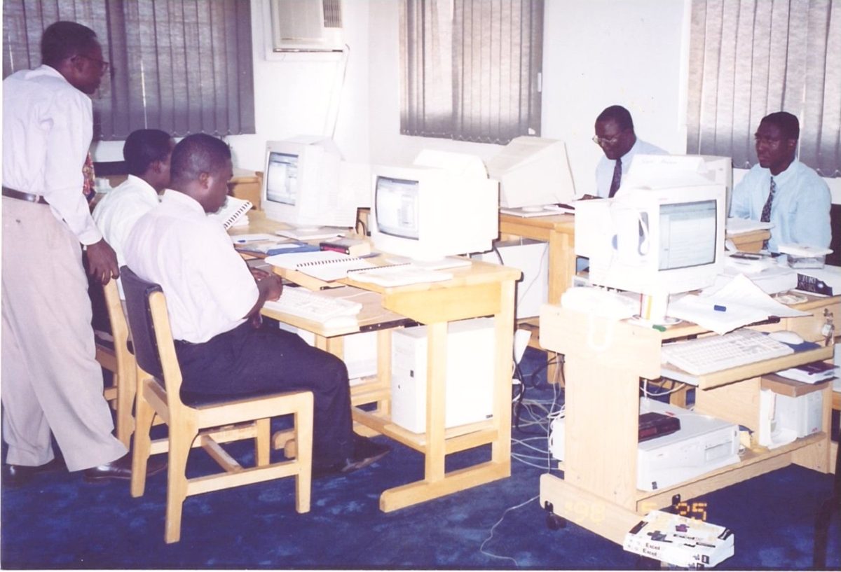 Inside IPMC's first office, a small room with a few computers
